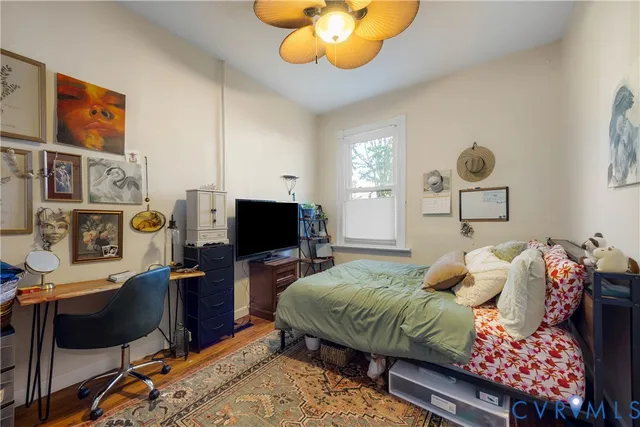 a bedroom with a bed and furniture