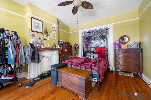 a bed room with a bed and a chandelier