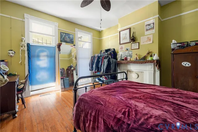 a bed room with a bed and a walk in closet