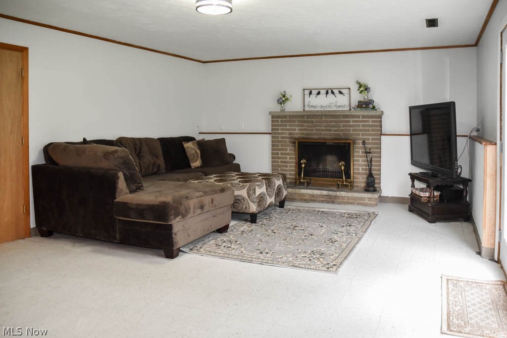 1245 Cherry Road Northwest Massillon, OH 44647 - Photo 3 of 21 Sprawling family room with a wood burning fireplace.