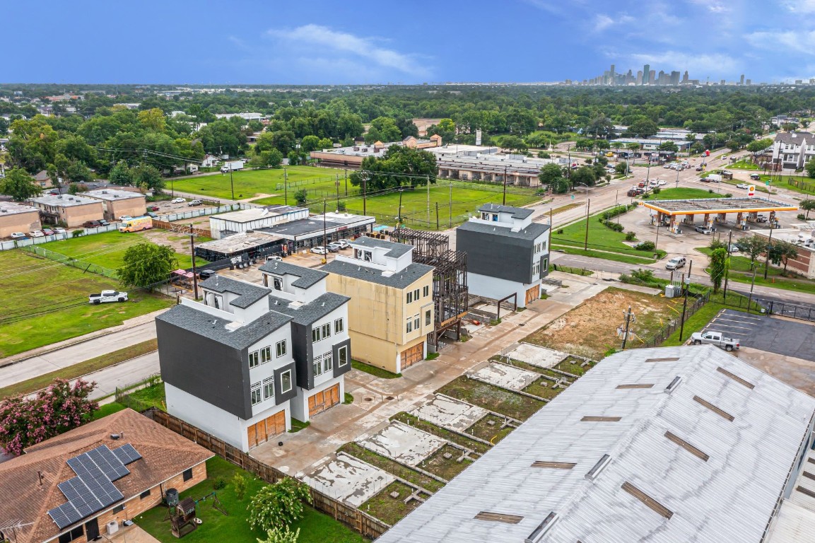 302 West Hamilton Street Houston, TX 77076 - Photo 4 of 12 an aerial view of a house with a lake view and mountain view