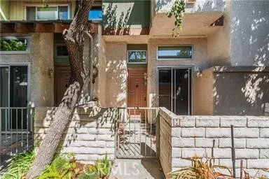 a garden view with a fountain