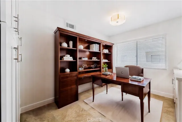 a view of a workspace with furniture