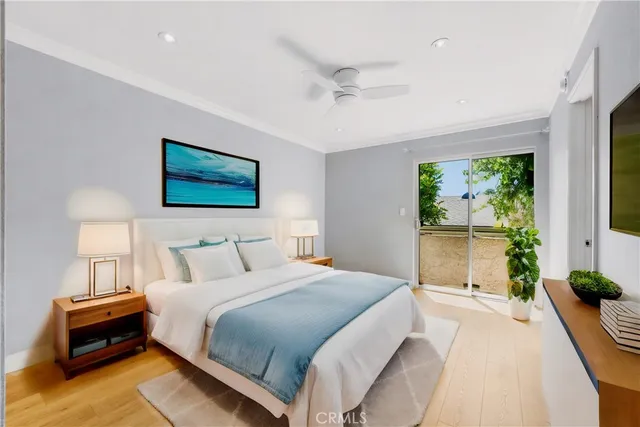 a bedroom with a bed and a view of bedroom