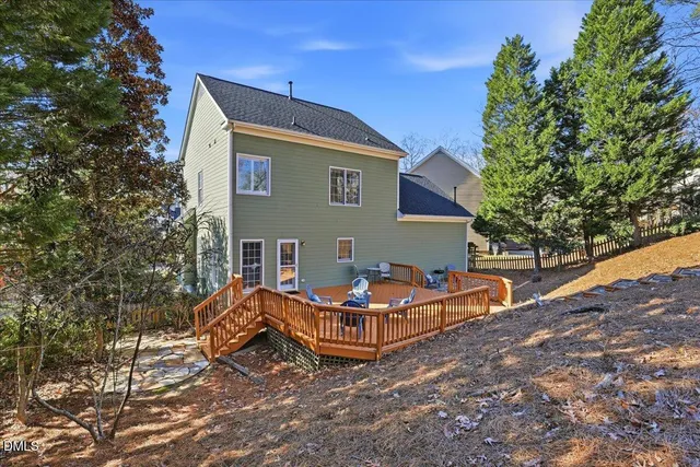 a kitchen with stainless steel appliances granite countertop a refrigerator stove microwave and sink