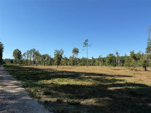 a view of a lake and outdoor space