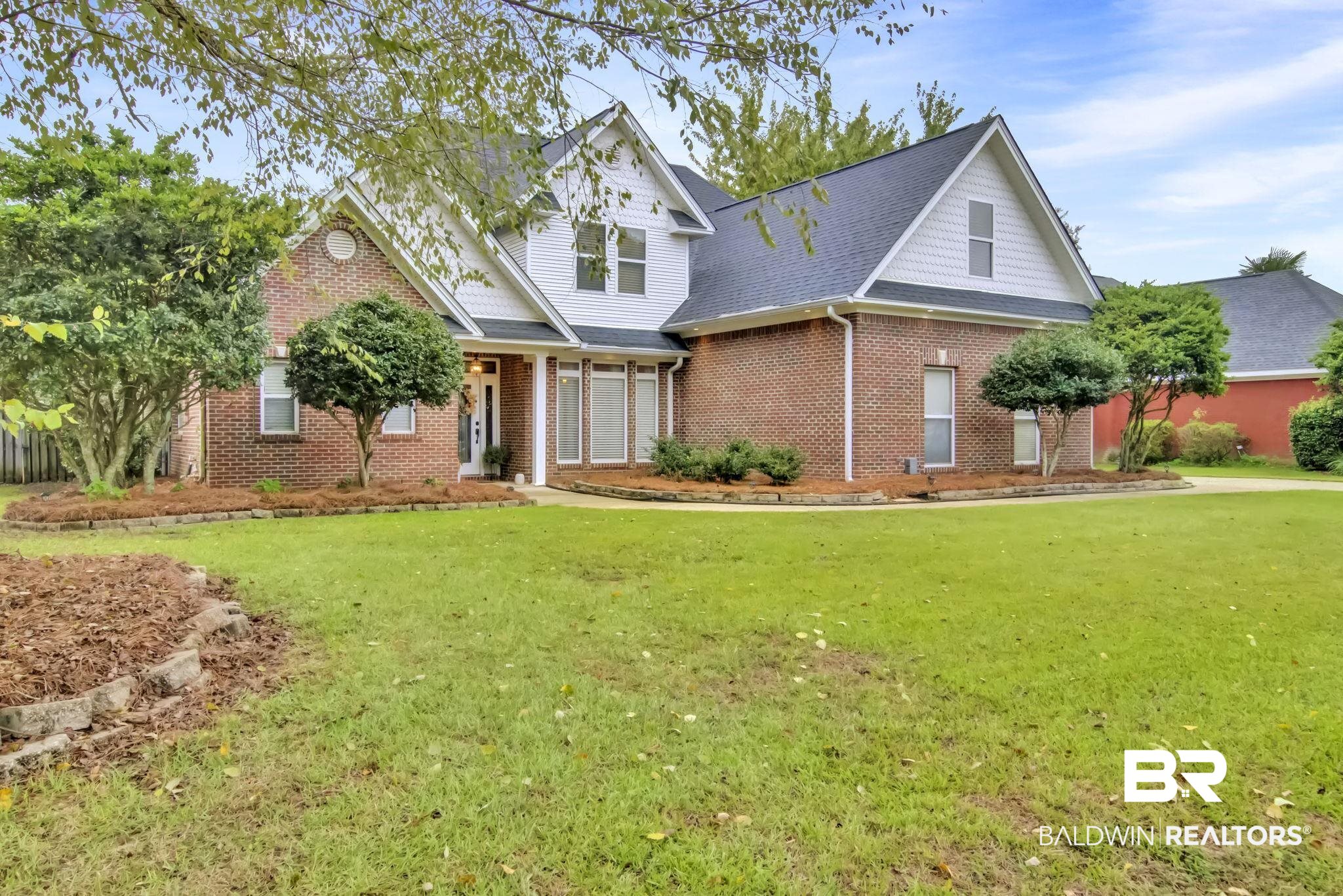9002 Parliament Circle Daphne, AL 36526 - Photo 5 of 73 View of front property featuring a front yard