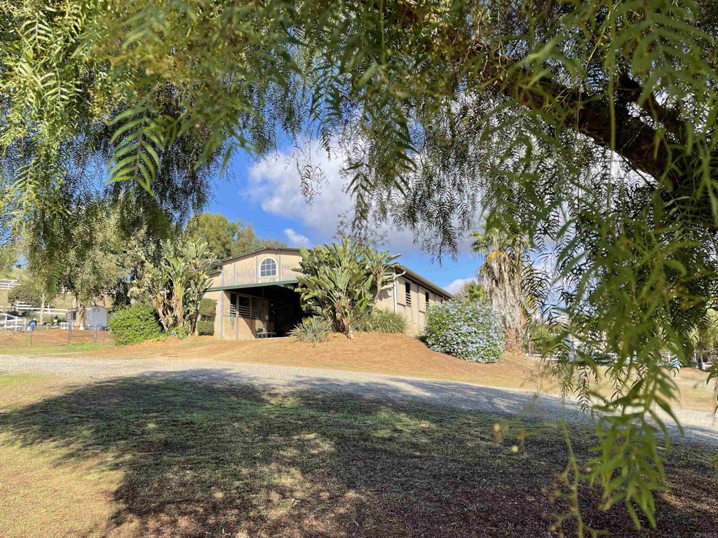2357 Vía Monserate Fallbrook, CA 92028 - Photo 2 of 28 a view of a yard with an outdoor space