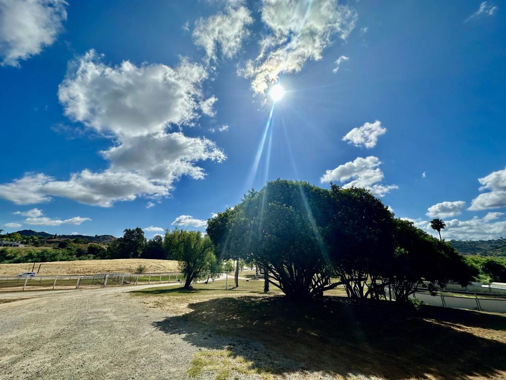 2357 Vía Monserate Fallbrook, CA 92028 - Photo 26 of 28 a view of a lake in middle of the house