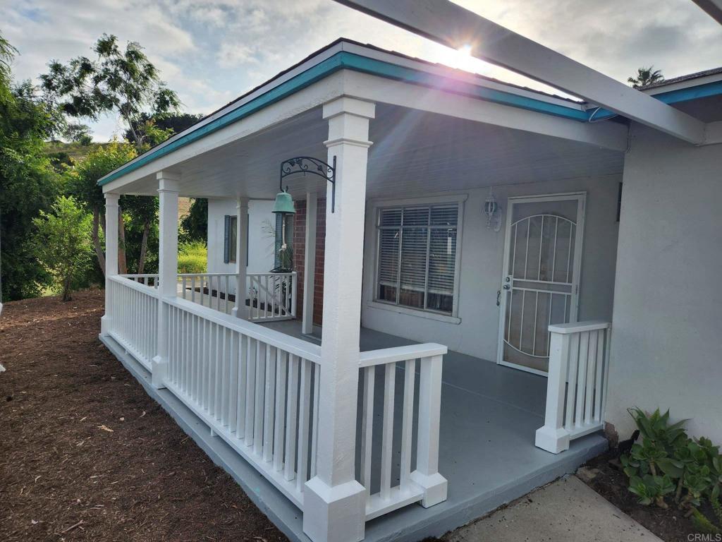 2357 Vía Monserate Fallbrook, CA 92028 - Photo 10 of 28 a view of a house with wooden deck