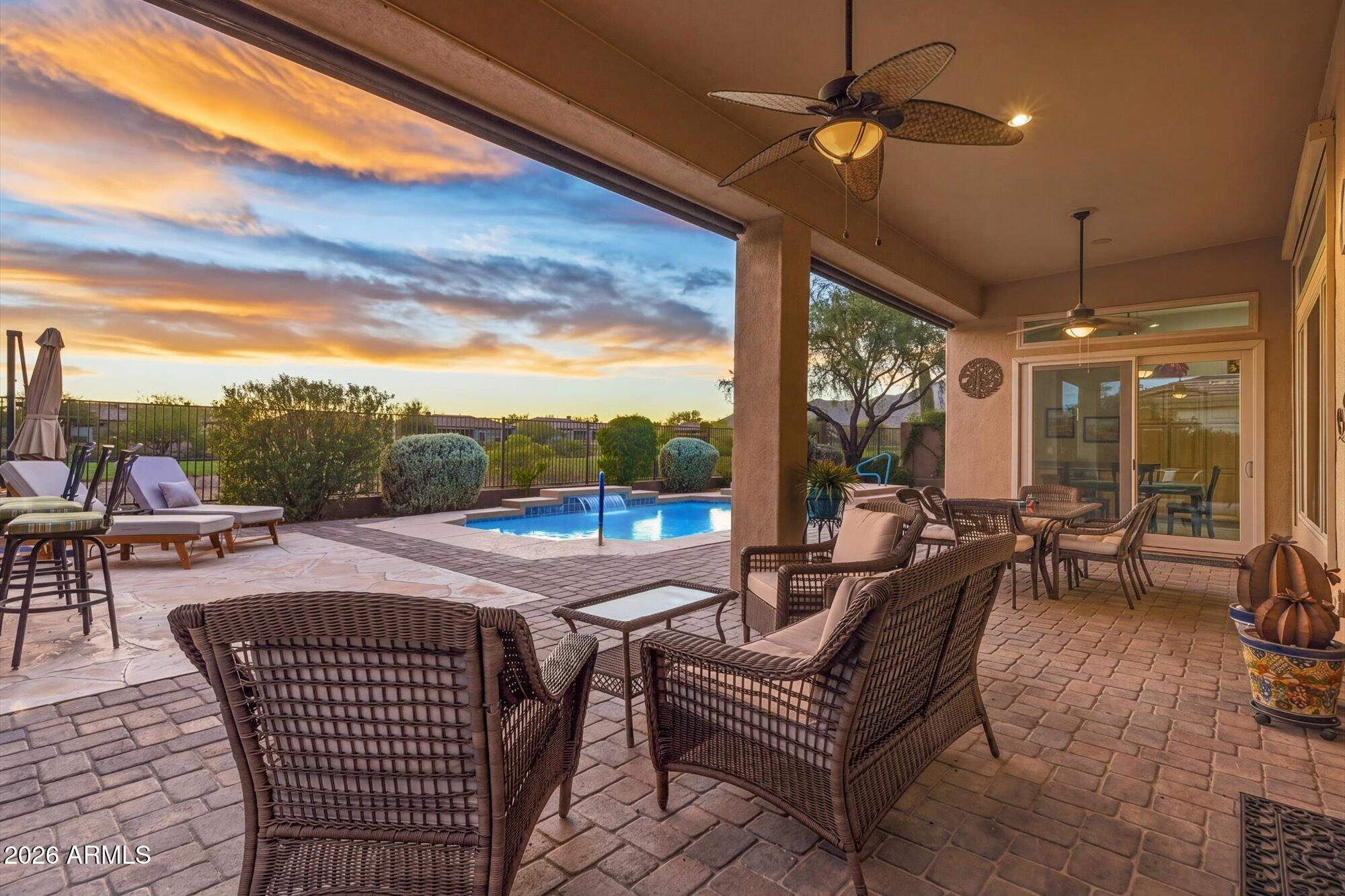40322 North Hawk Ridge Trail Anthem, AZ 85086 - Photo 36 of 63 a outdoor space with patio furniture and a potted plant
