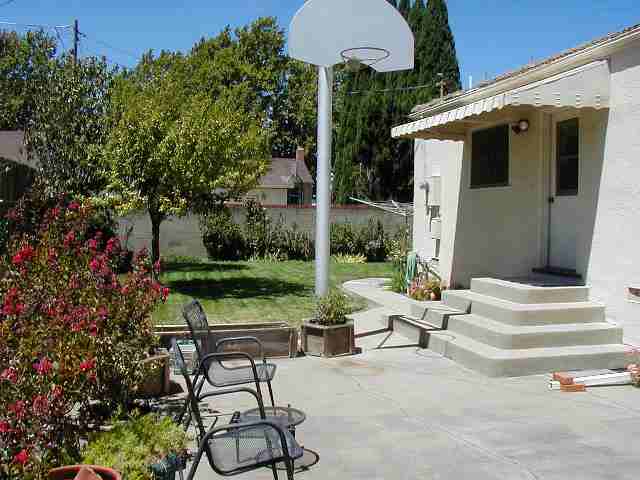 148 North 4th Street Rio Vista, CA 94571 - Photo 7 of 7 a view of a patio with couches table and chairs and potted plants
