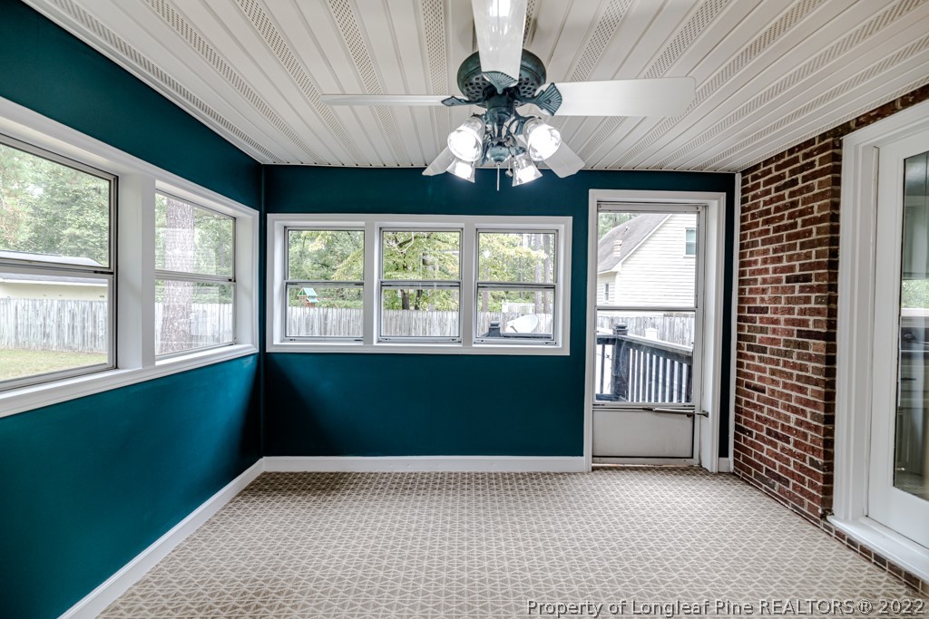 110 Cypress Road Cameron, NC 28326 - Photo 16 of 35 wooden floor in an empty room with a window