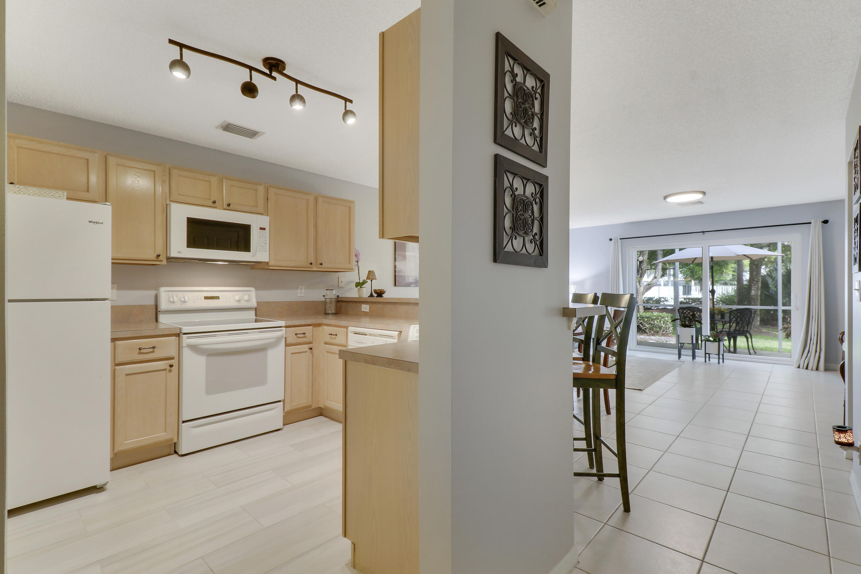 145 Timberwalk Trail Jupiter, FL 33458 - Photo 5 of 35 Kitchen/Living Room