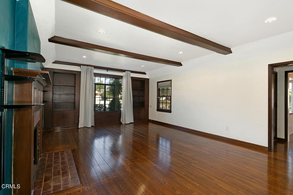 1060 West Roses Road San Gabriel, CA 91775 - Photo 3 of 12 a view of gallery with wooden floor