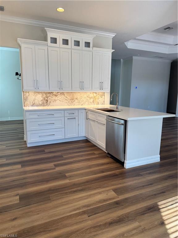6592 Marbella Lane Naples, FL 34105 - Photo 7 of 18 a view of kitchen cabinets and wooden floor