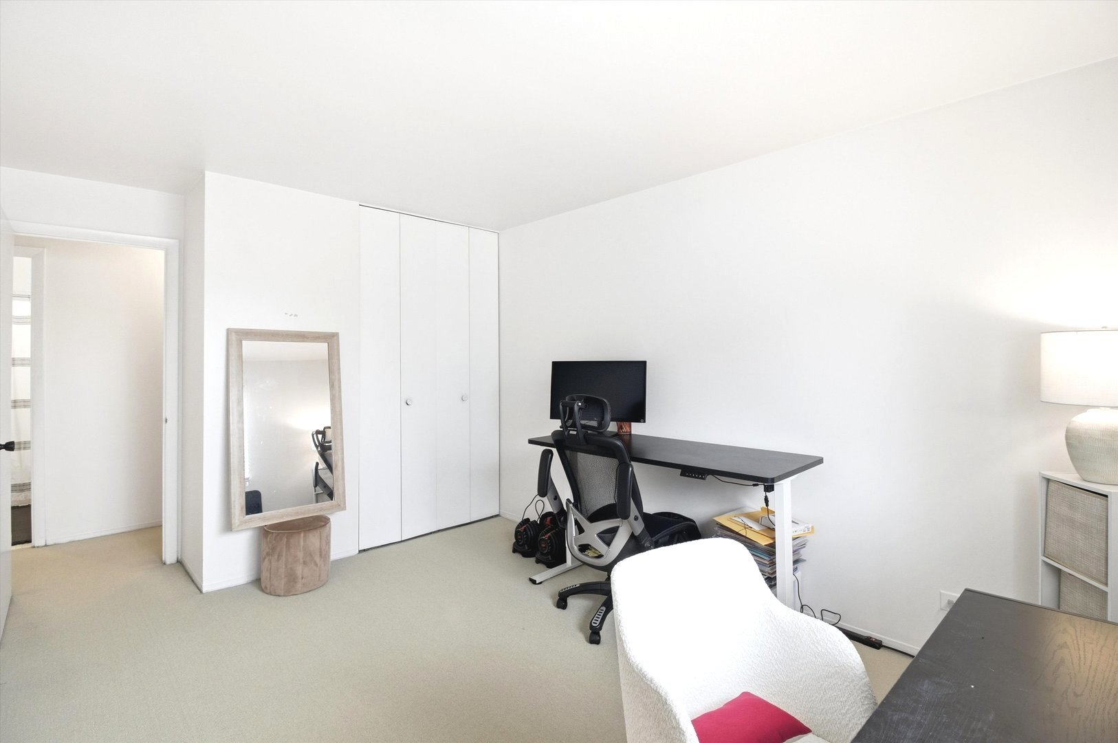 8640 Waukegan Road, Unit 123 Morton Grove, IL 60053 - Photo 14 of 30 a view of a workspace with furniture and a window