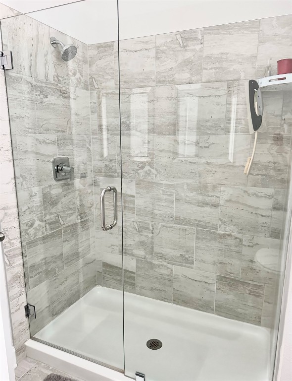 323 Sweetgum Street Yulee, FL 32097 - Photo 12 of 29 a bathroom with a shower