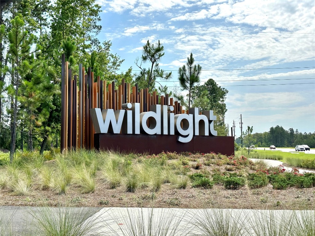 323 Sweetgum Street Yulee, FL 32097 - Photo 20 of 29 a view of a sign board with yard