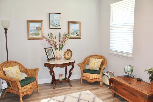 a living room with furniture and a window