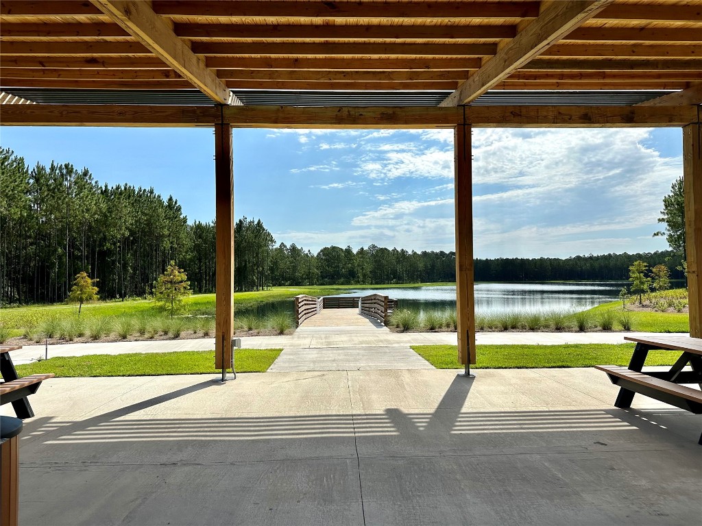 323 Sweetgum Street Yulee, FL 32097 - Photo 24 of 29 a view of a street with a patio