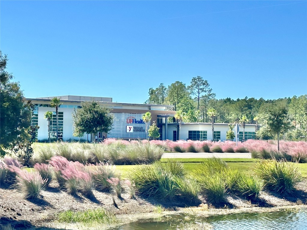 323 Sweetgum Street Yulee, FL 32097 - Photo 27 of 29 a view of a yard with a patio