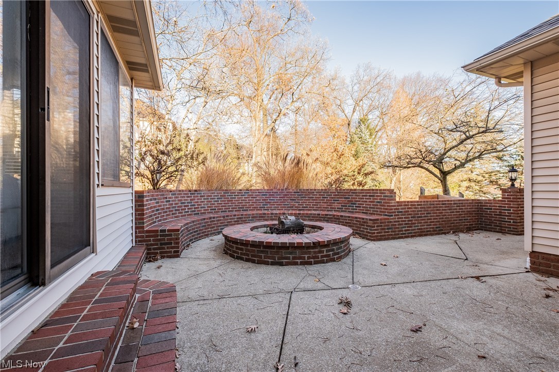 6216 Rockside Circle Northwest Canton, OH 44718 - Photo 32 of 33 View of patio / terrace with an outdoor fire pit