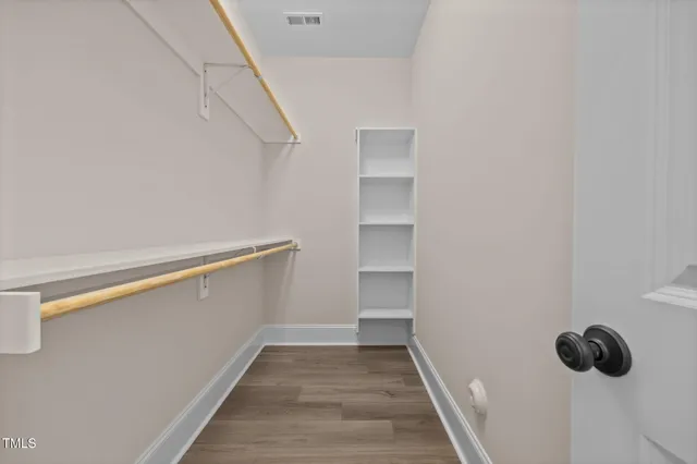 a view of a swimming pool with a yard