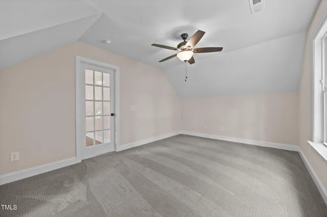 a view of a swimming pool with a yard