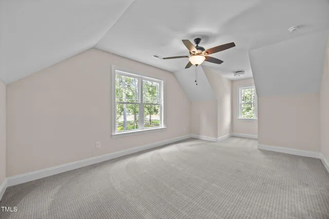 a view of a swimming pool with a yard