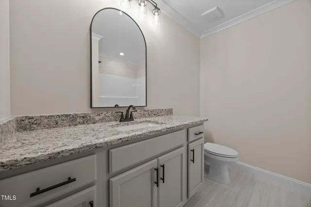 a view of large trees with a yard