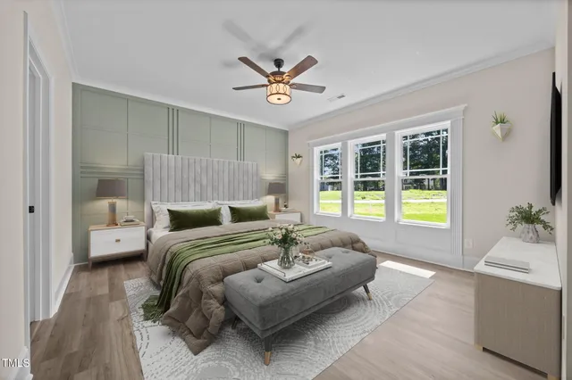 a bedroom with a bed and a couch