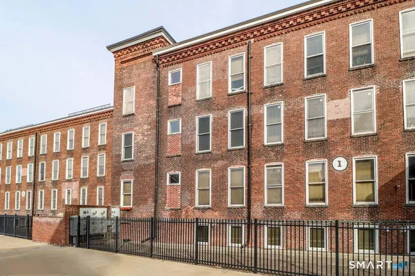 a front view of a brick building
