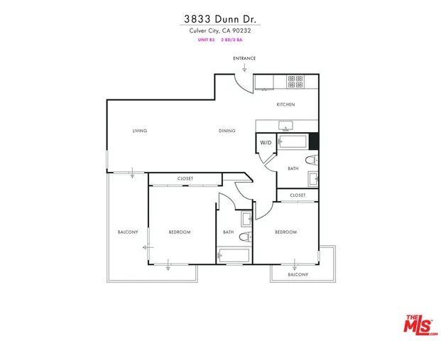 a roof deck with table and chairs