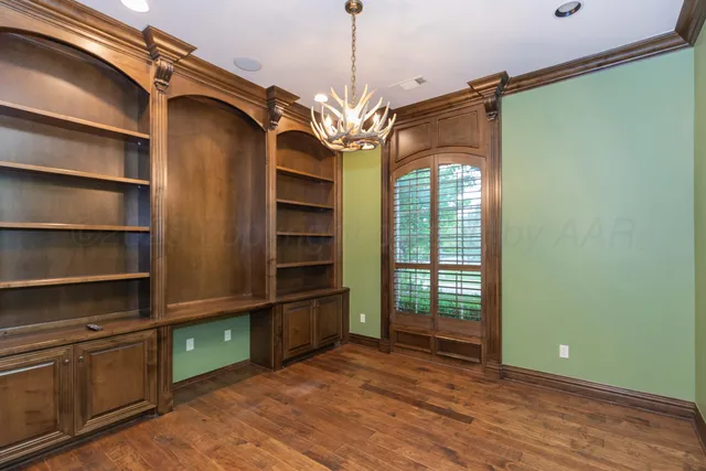 a view of an entryway with chandelier