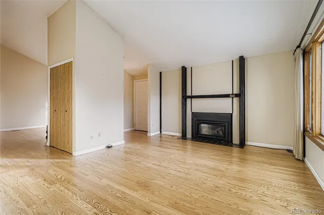 a view of a livingroom with a fireplace