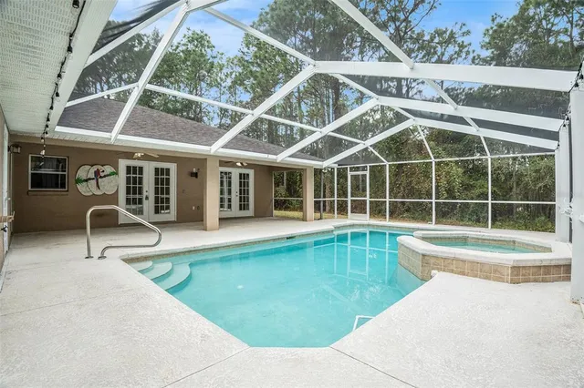 a view of a house with a swimming pool