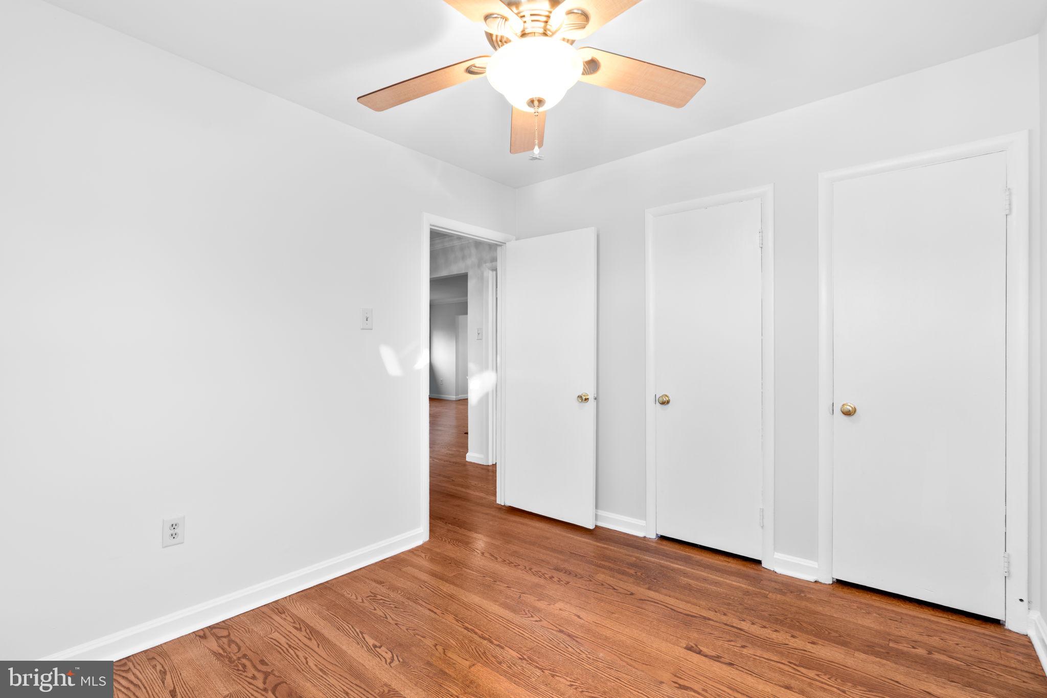 302 Regency Circle Linthicum Heights, MD 21090 - Photo 22 of 33 a view of an empty room with wooden floor