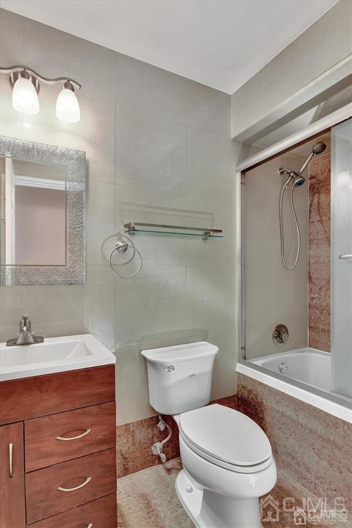 136 Redpine Loop Old Bridge, NJ 08857 - Photo 15 of 22 a bathroom with a sink a toilet and shower