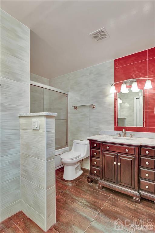 136 Redpine Loop Old Bridge, NJ 08857 - Photo 19 of 22 a bathroom with a sink a toilet and shower