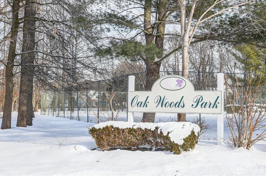 136 Redpine Loop Old Bridge, NJ 08857 - Photo 21 of 22 a street sign on a pole on a road