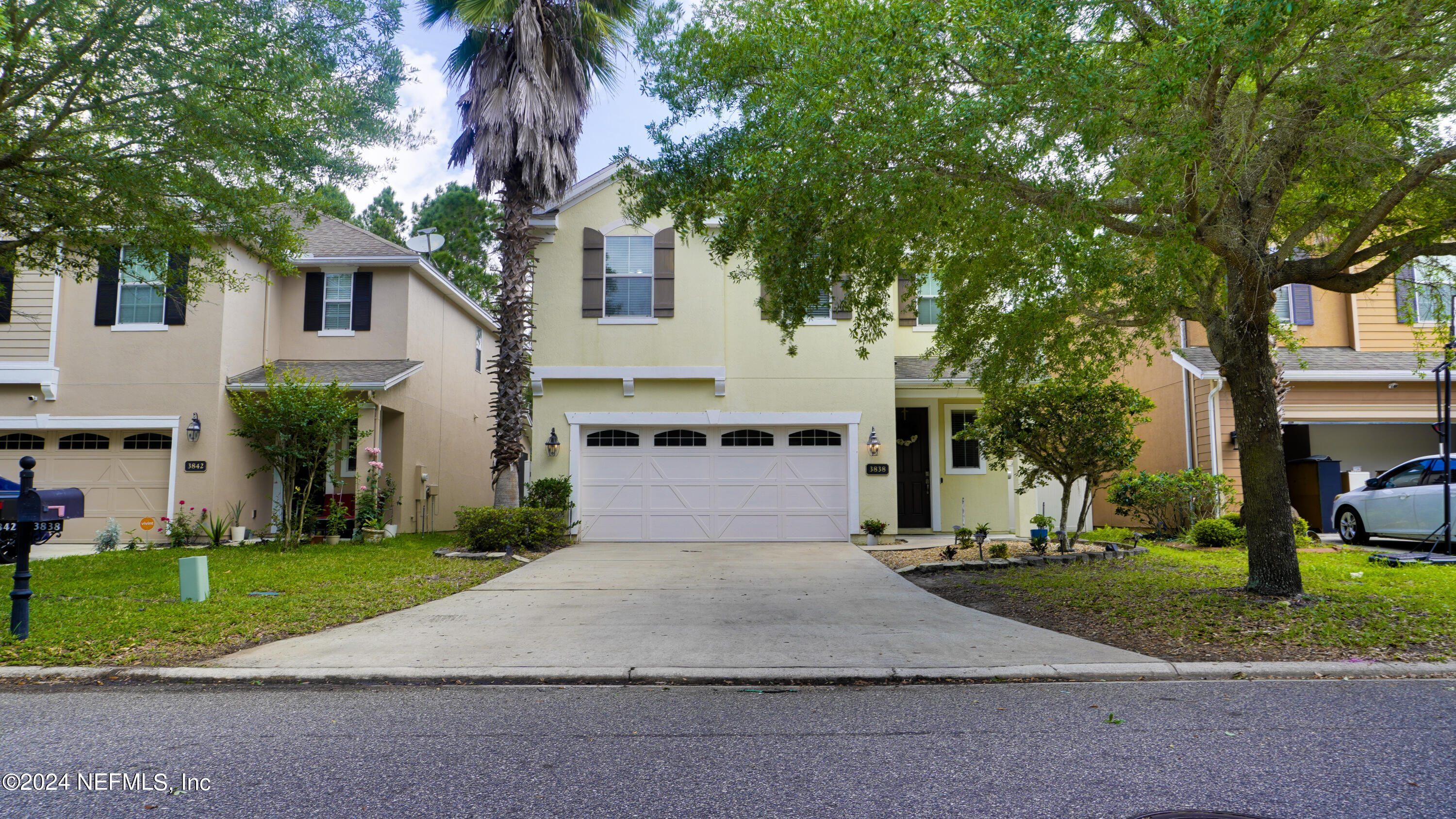 3838 Chasing Falls Road Orange Park, FL 32065 - Photo 1 of 33 a front view of a house with a yard and trees