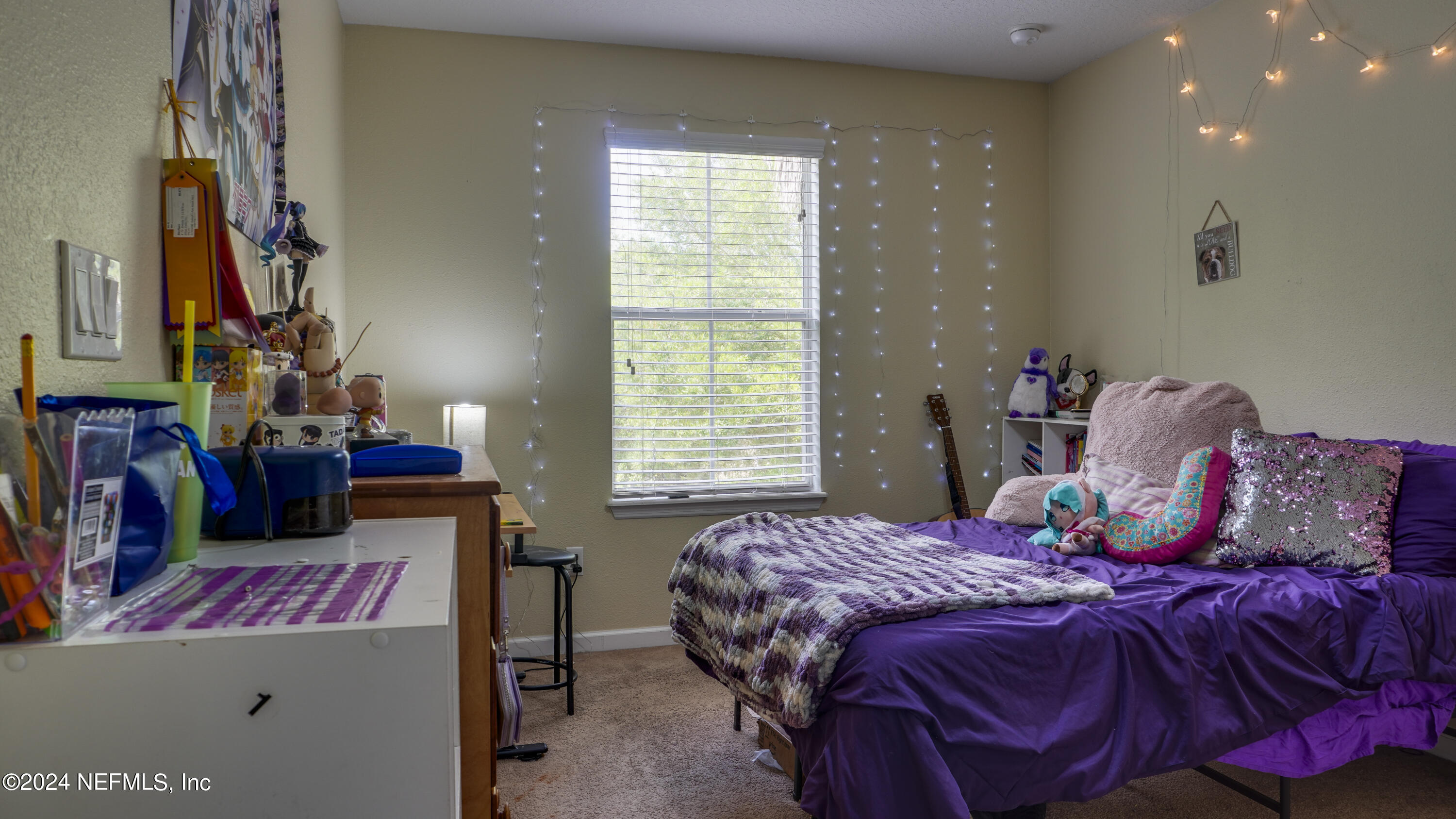 3838 Chasing Falls Road Orange Park, FL 32065 - Photo 17 of 33 a bed room with a bed and a window