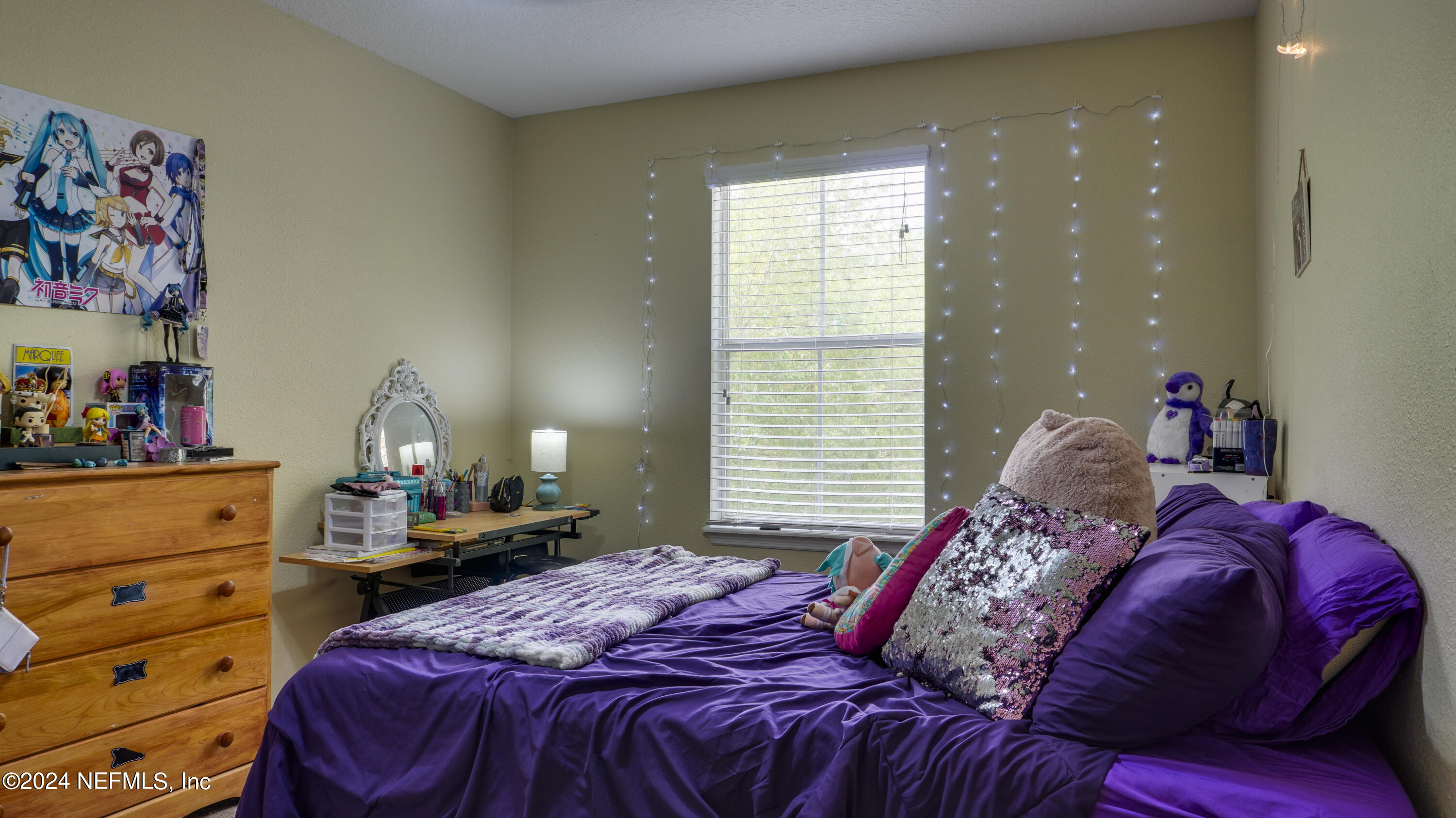 3838 Chasing Falls Road Orange Park, FL 32065 - Photo 18 of 33 a bedroom with a bed and a window