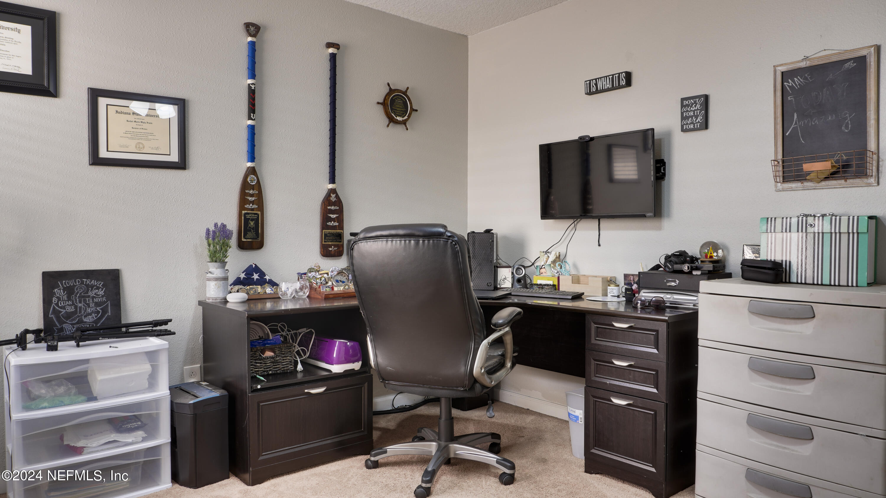 3838 Chasing Falls Road Orange Park, FL 32065 - Photo 20 of 33 a view of a workspace with furniture and a flat screen tv