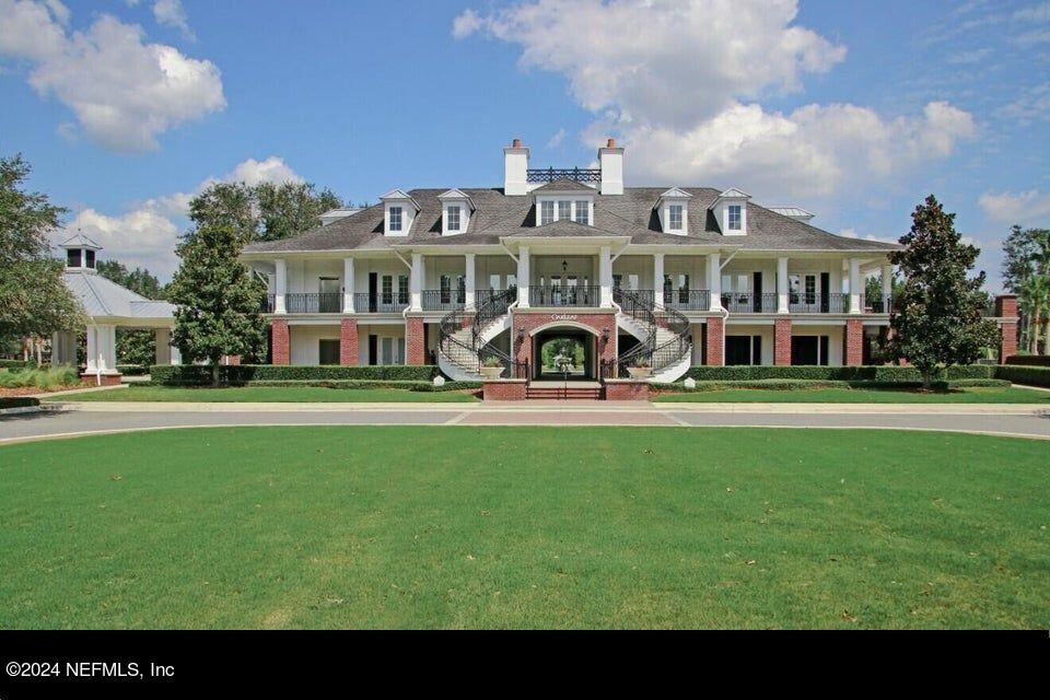 3838 Chasing Falls Road Orange Park, FL 32065 - Photo 27 of 33 a front view of a house with a garden area