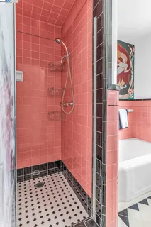 a bed room with a bed and a chandelier