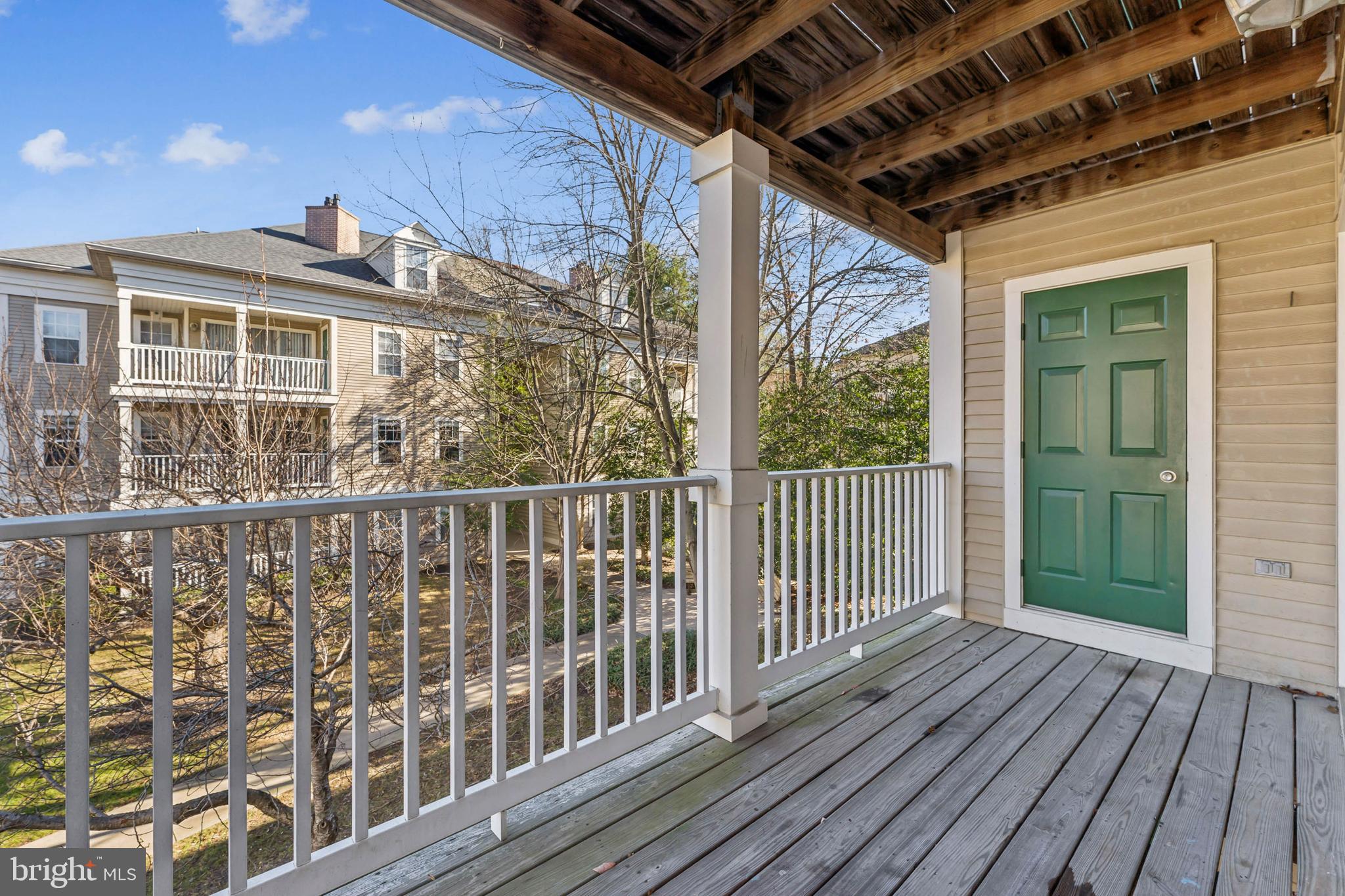13117 Millhaven Place, Unit 14F Germantown, MD 20874 - Photo 15 of 25 Balcony with storage closet