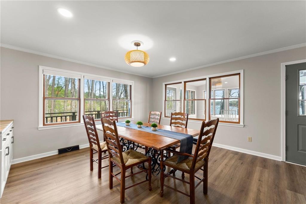 103 Tugalo Point Lavonia, GA 30553 - Photo 11 of 70 a view of a dining room with furniture and wooden floor