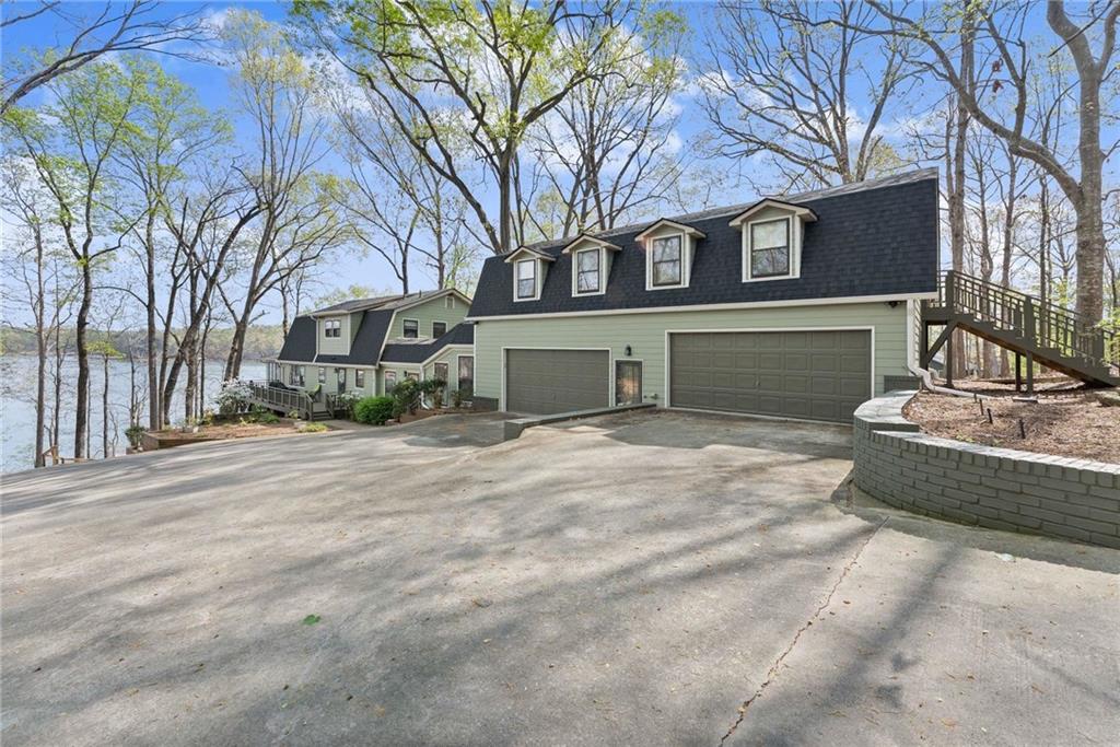 103 Tugalo Point Lavonia, GA 30553 - Photo 2 of 70 a front view of a house with a yard